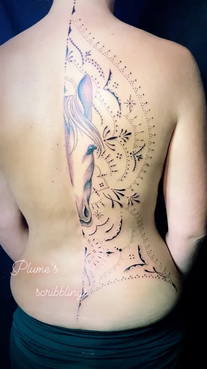 Tatouage de Plume's scribblings