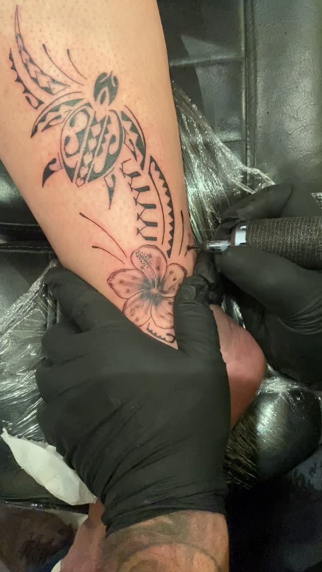 Tatouage de Tattoo Evasion Piercing