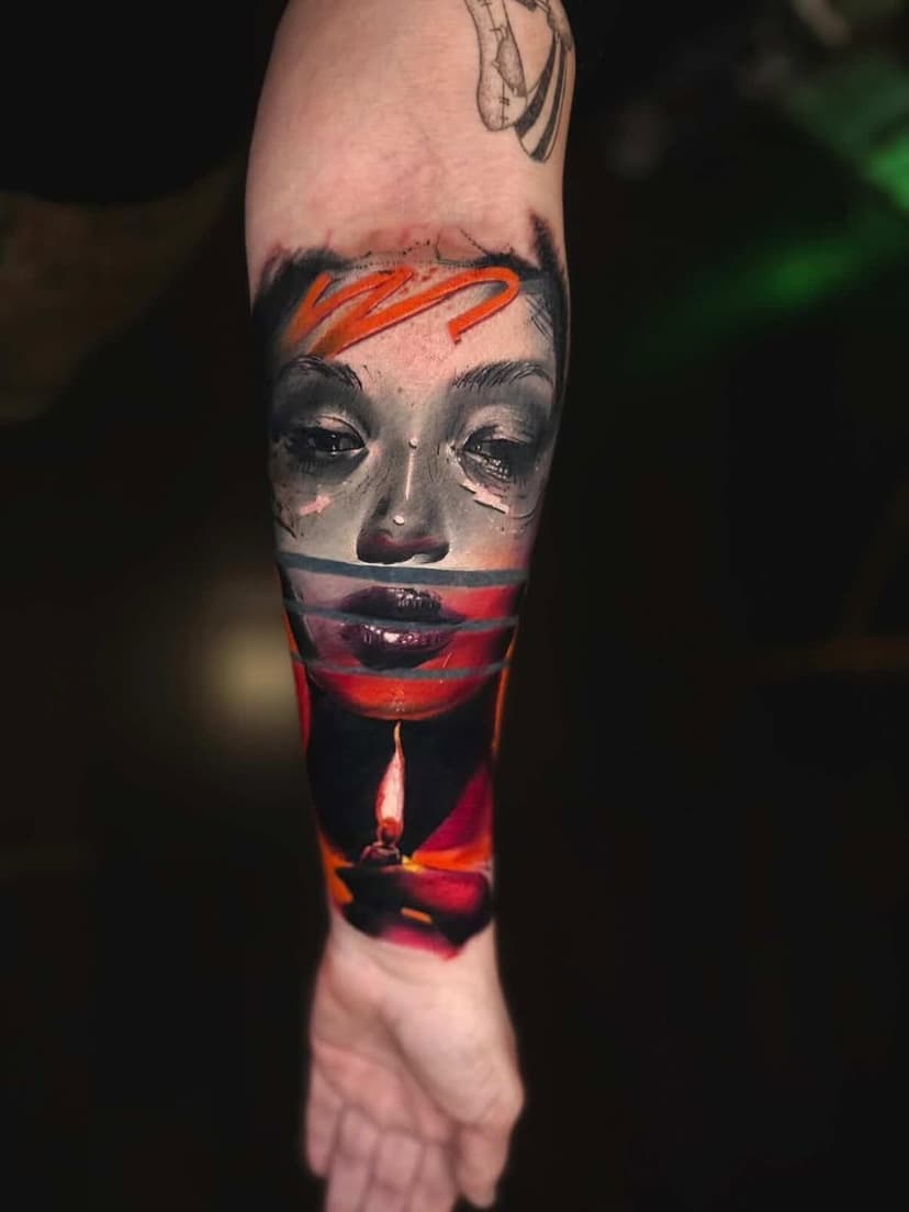 Tatouage de Candelabre Tattoo Studio