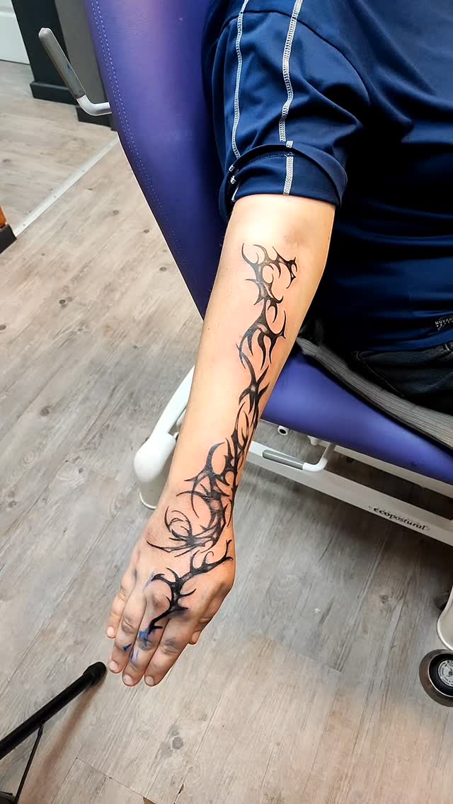 Tatouage de Color Titanium Studio