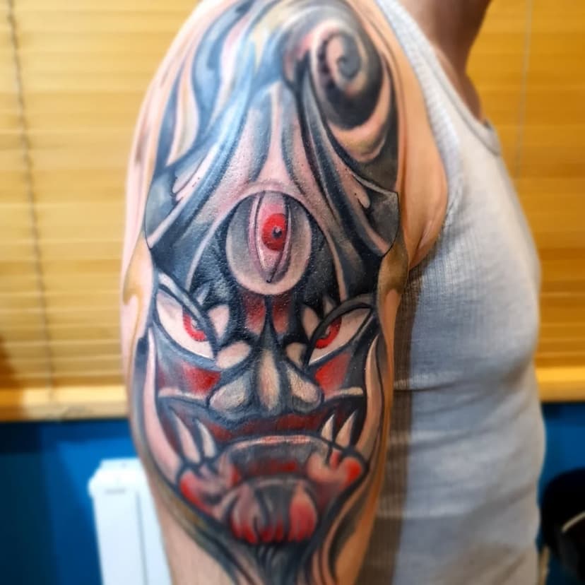 Tatouage de Cro Magnum Tattoo