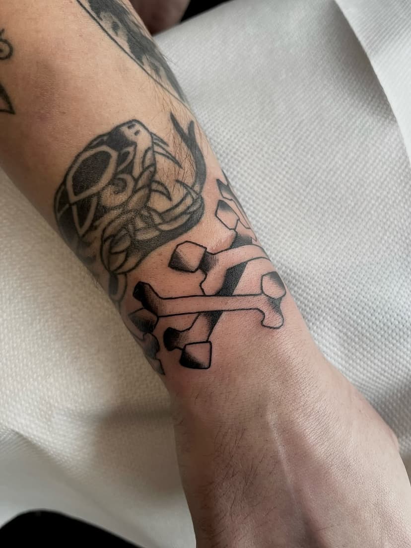 Tatouage de Da Caw Tattoo