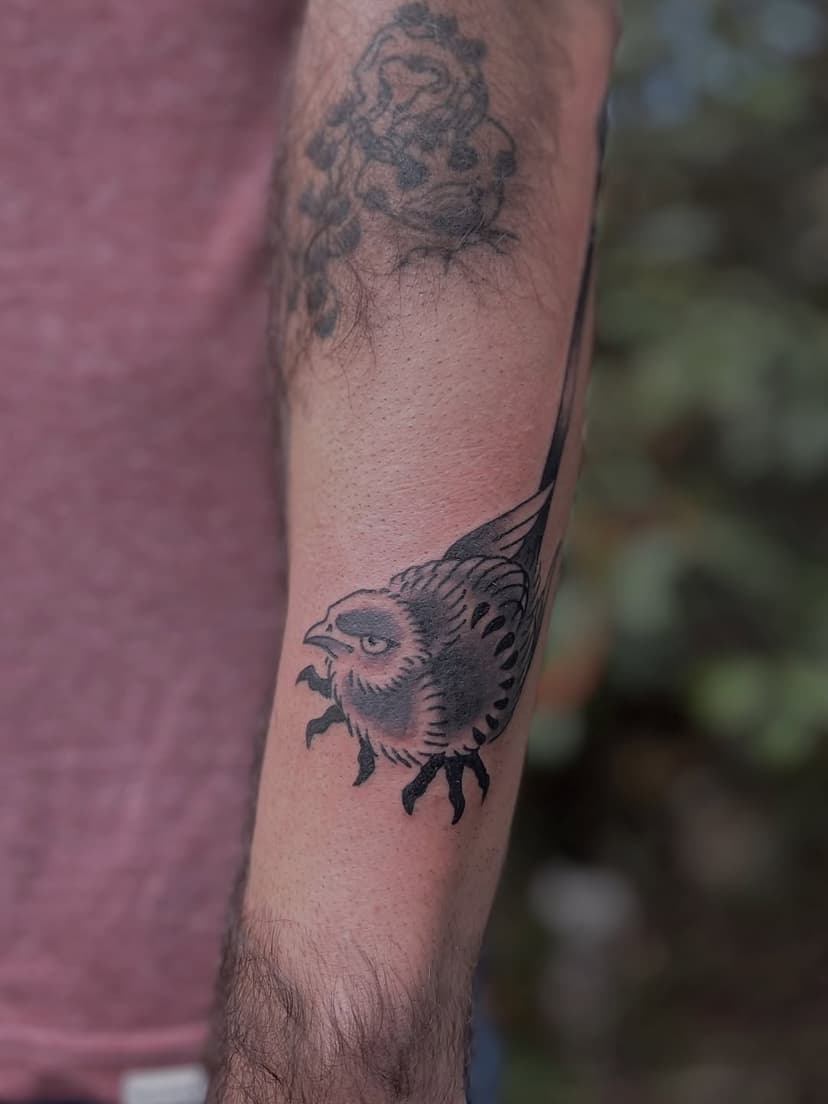 Tatouage de Da Caw Tattoo