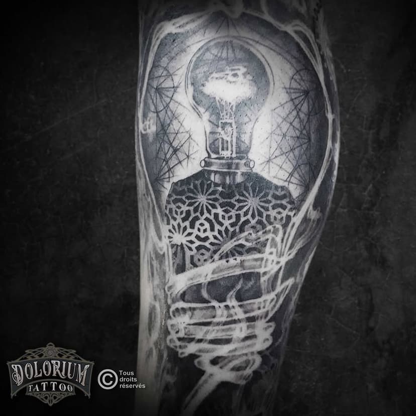 Tatouage de DOLORIUM tattoo