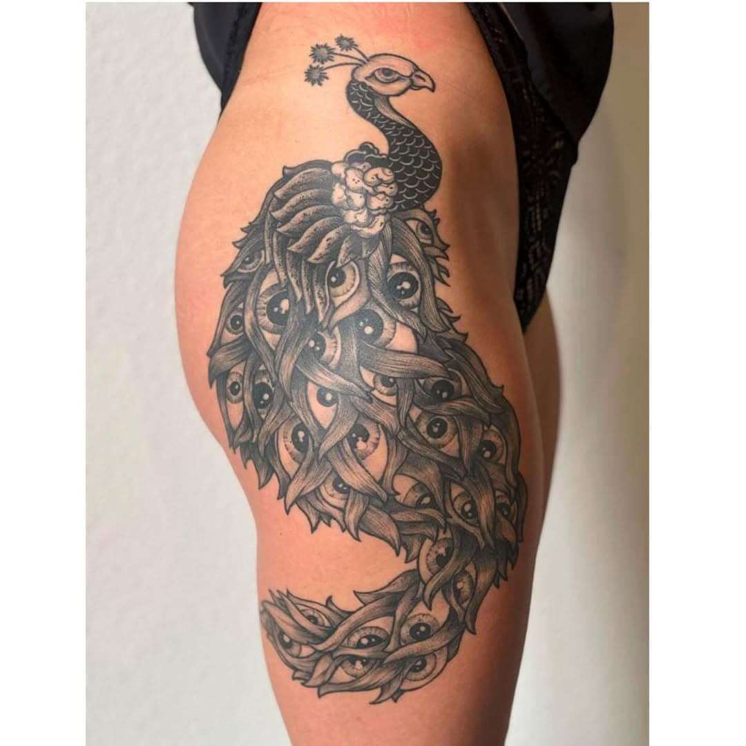 Tatouage par L'Œil Noir Tattoo