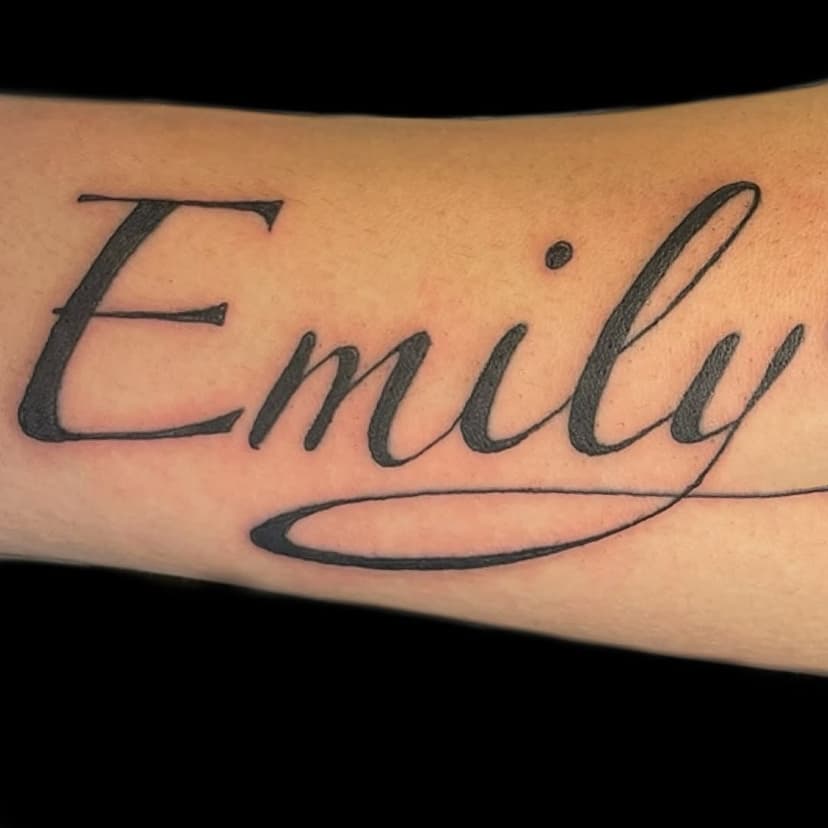 Tatouage de M Tattoo