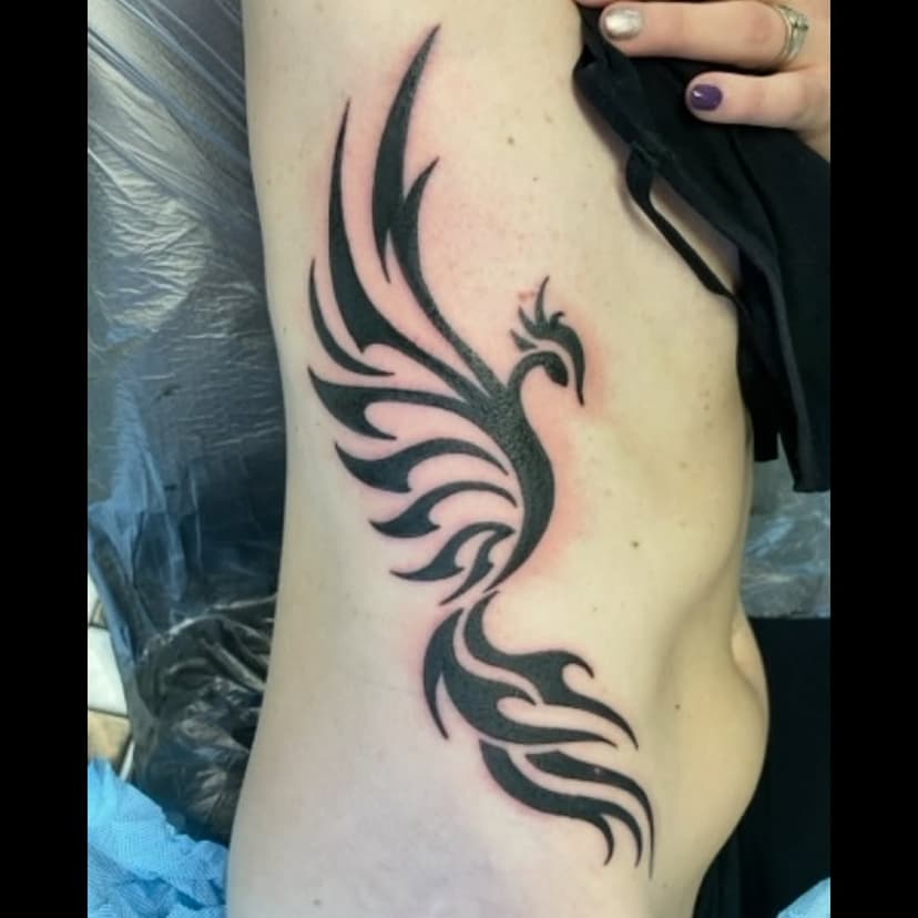 Tatouage de M Tattoo