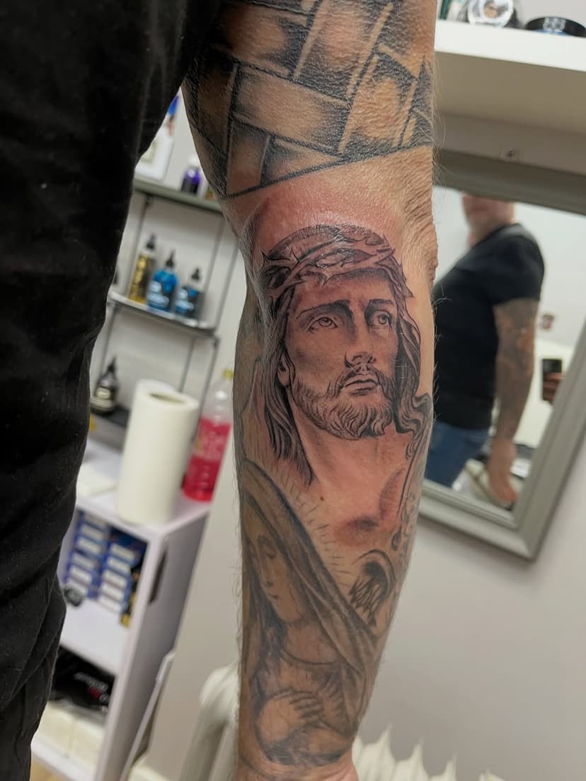 Tatouage de M Tattoo