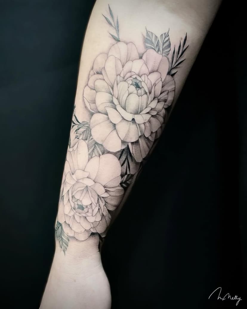 Tatouage de Miss Nelly Tattoo Shop