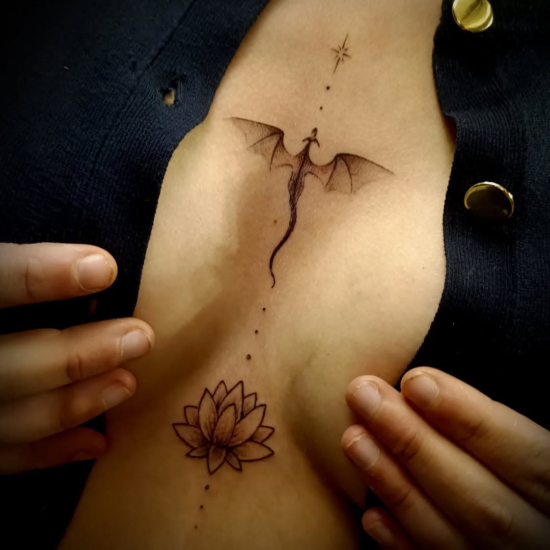 Tatouage par Rijdi's Body Art