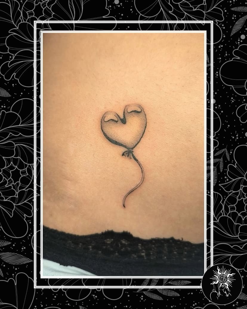 Tatouage de Vassilissa & Soleil Noir