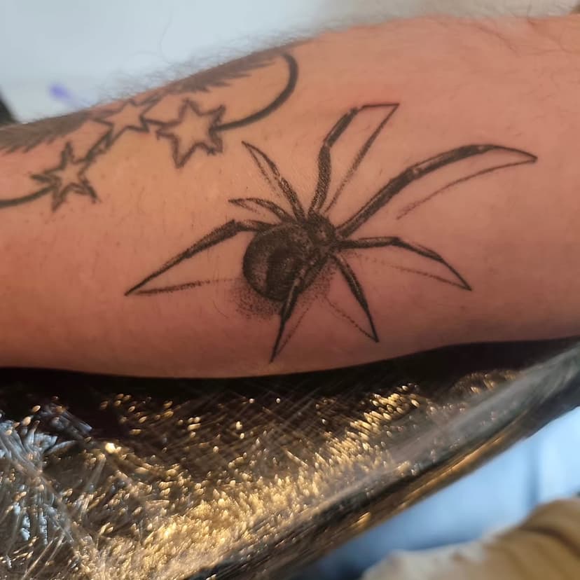 Tatouage de L'atelier du Kptaine