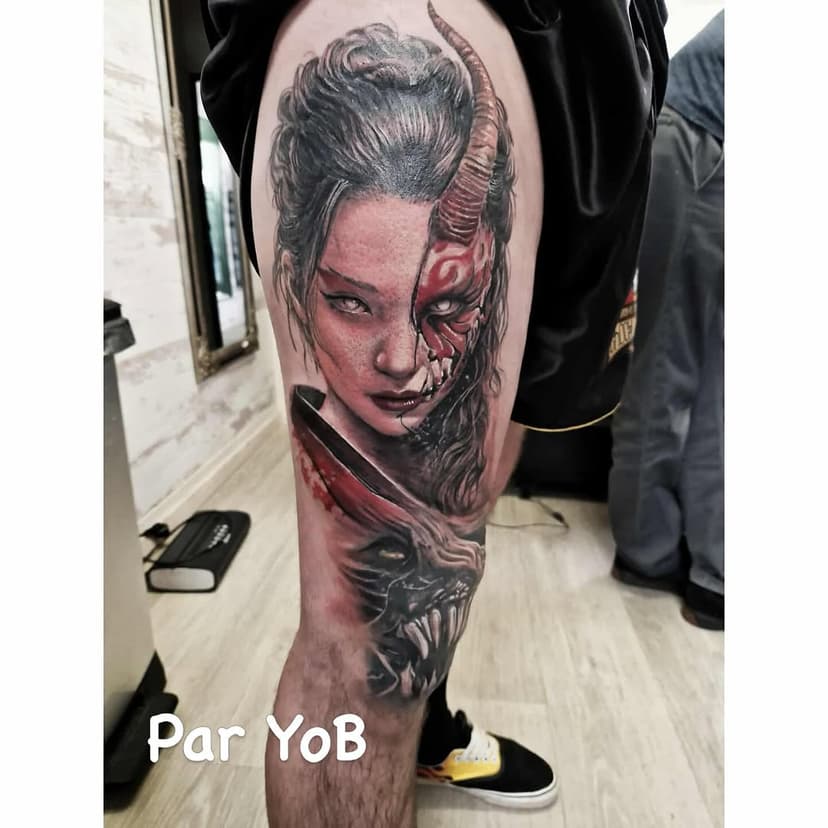 Tatouage de Criminal Kiss Tattoo Piercing