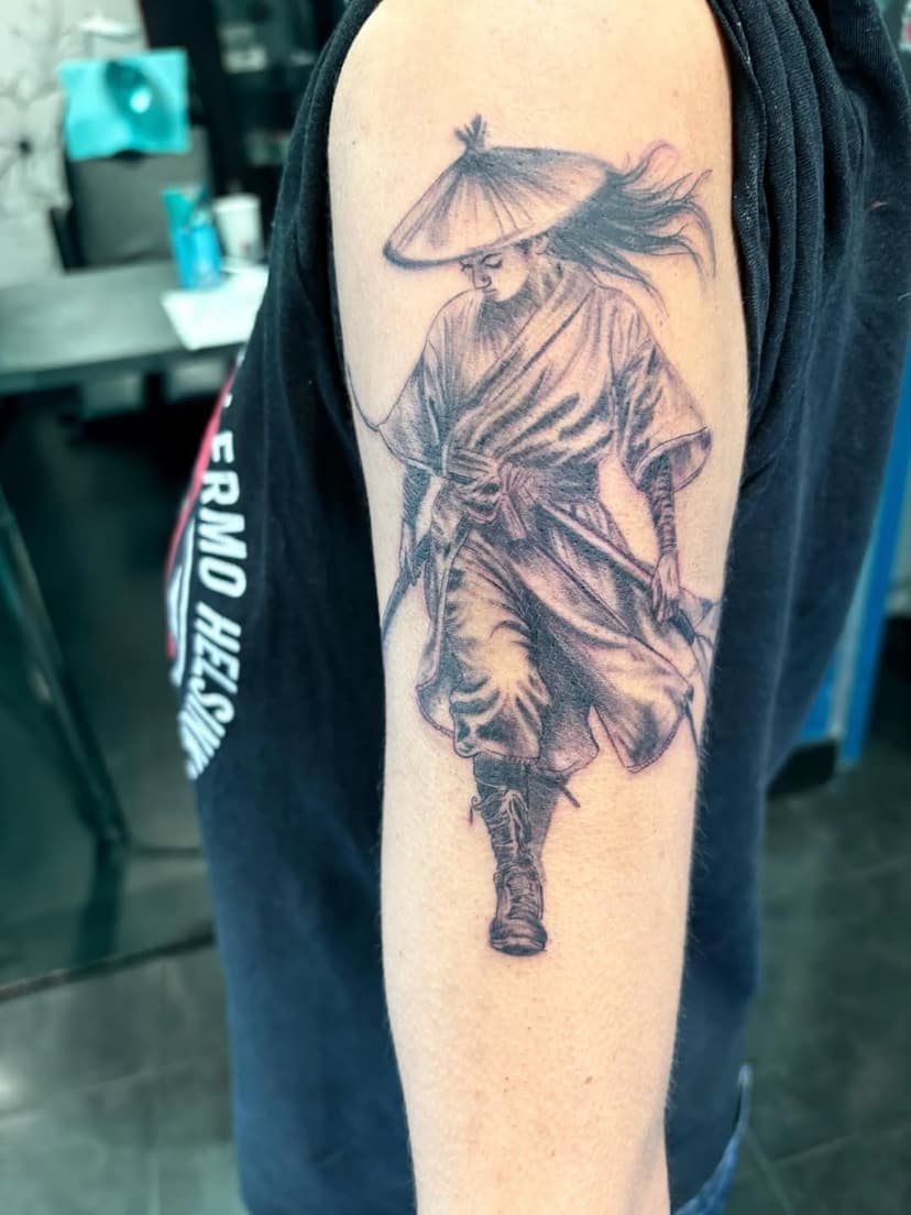 Tatouage de Dom Tattoo