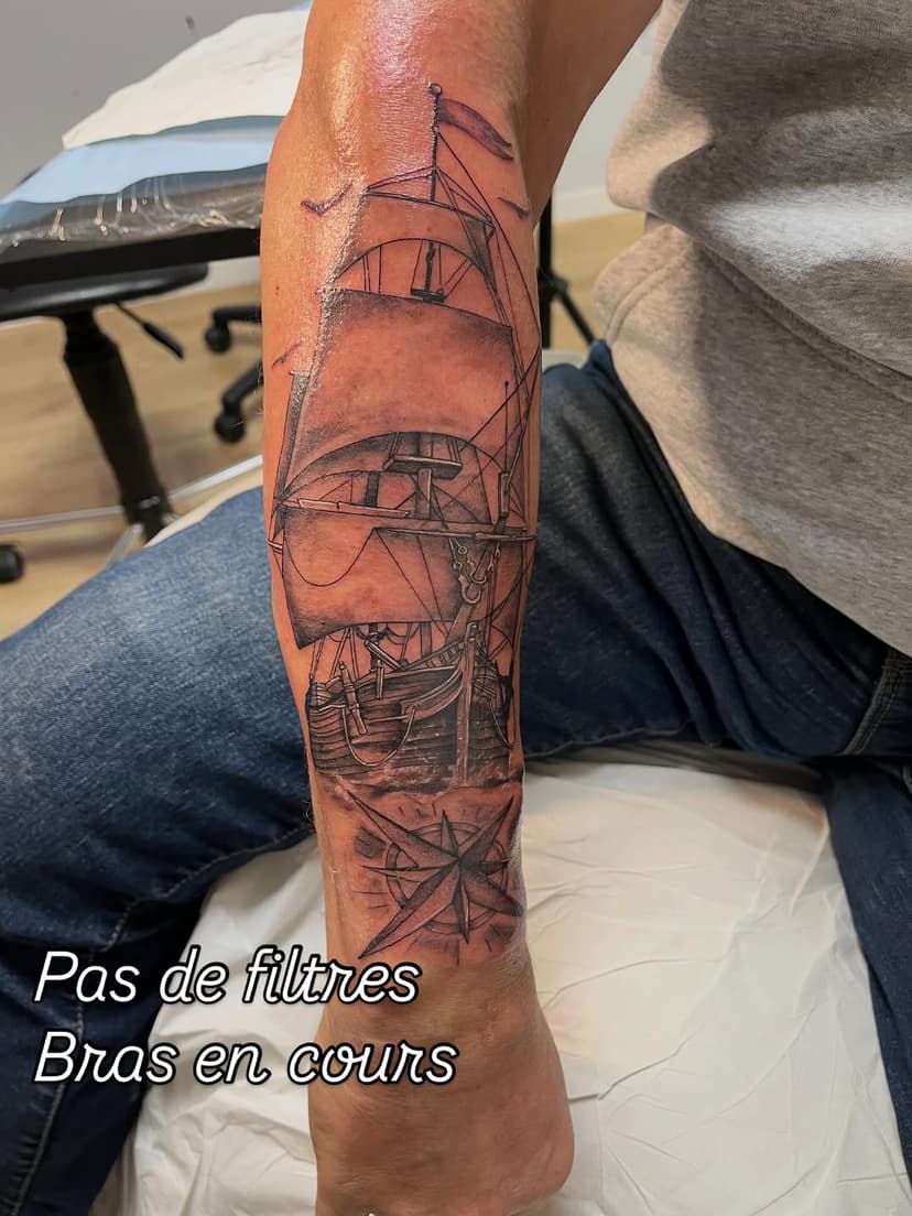 Tatouage de Vintage Tattoo Shop